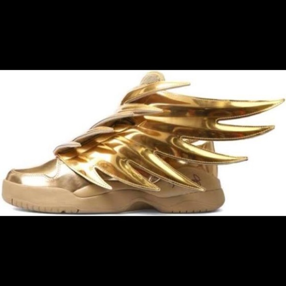JEREMY SCOTT/ ADIDAS GOLD SNEAKERS WITH WINGS.